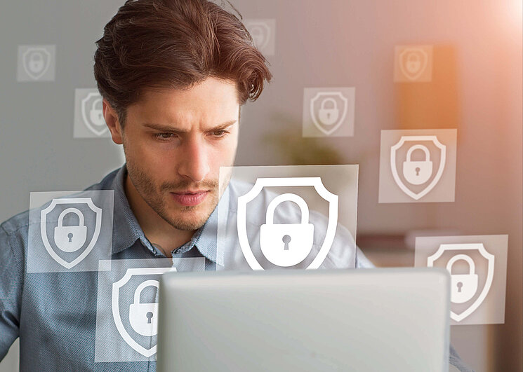 Man in front of Laptop