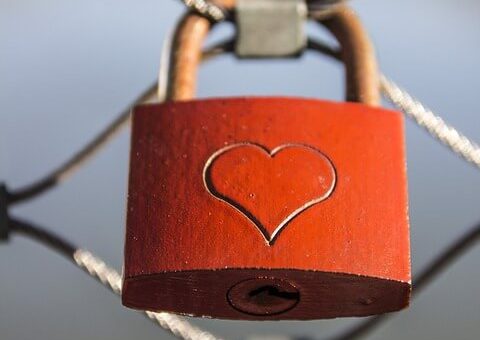 Red lock with a heart